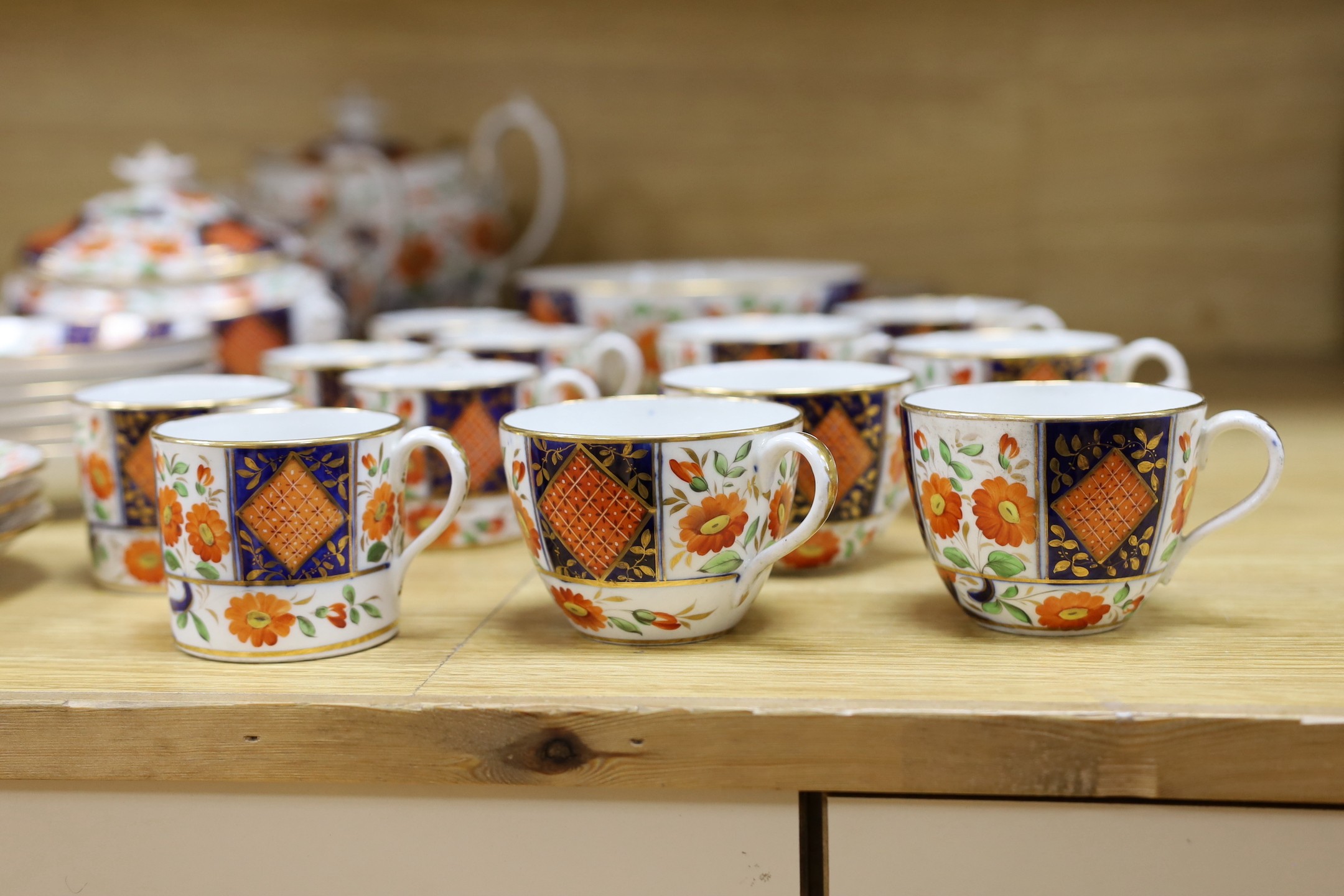 A 19th century English porcelain part tea and coffee set, probably Coalport and a similar Wedgwood part set